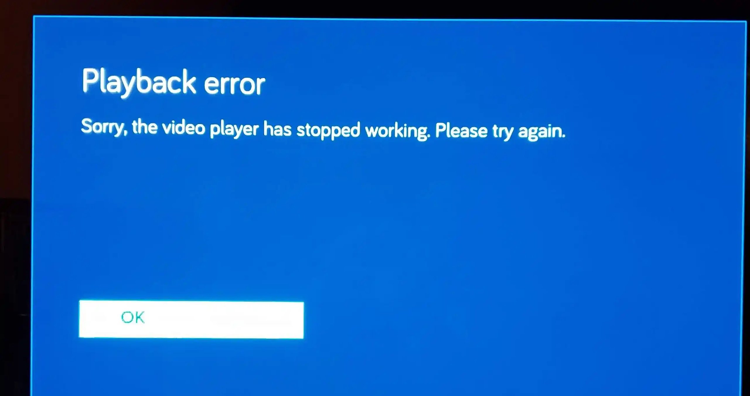 A screenshot of Vudu playback error message on a TV screen showing 'Playback error: Sorry, the video player has stopped working. Please try again'